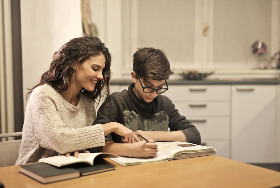 Volunteer tutoring a child in reading